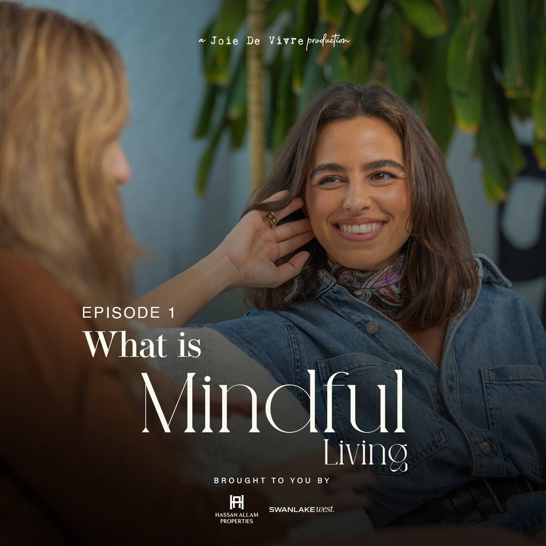Calm woman practicing mindful living during an interview or podcast session in a cozy, green environment.