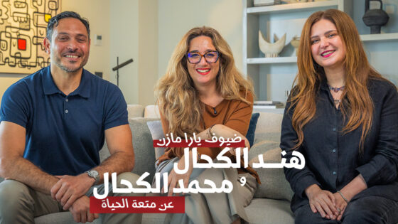 Formal group photo of three diverse professionals smiling in modern office setting, with stylish decor, for JDV.