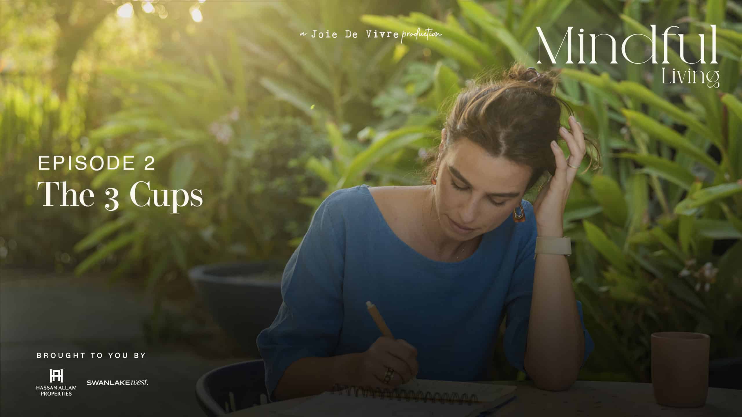 Mindful living episode 2 promotional image with a woman writing at a table surrounded by lush green plants, emphasizing relaxation, mindfulness, and lifestyle content.